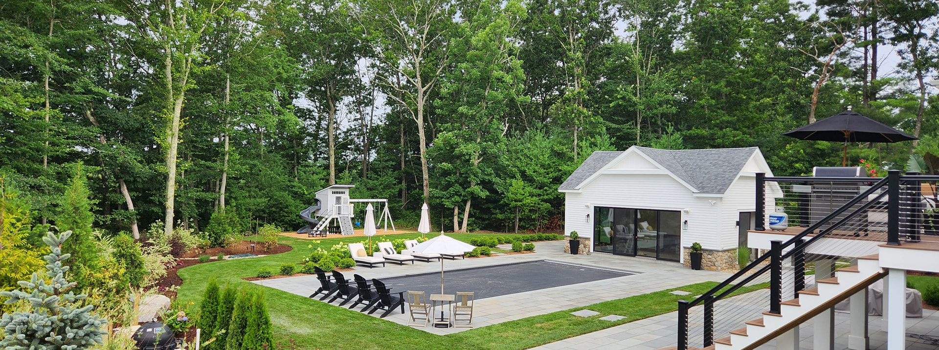 Backyard with pool, pool house and lawn